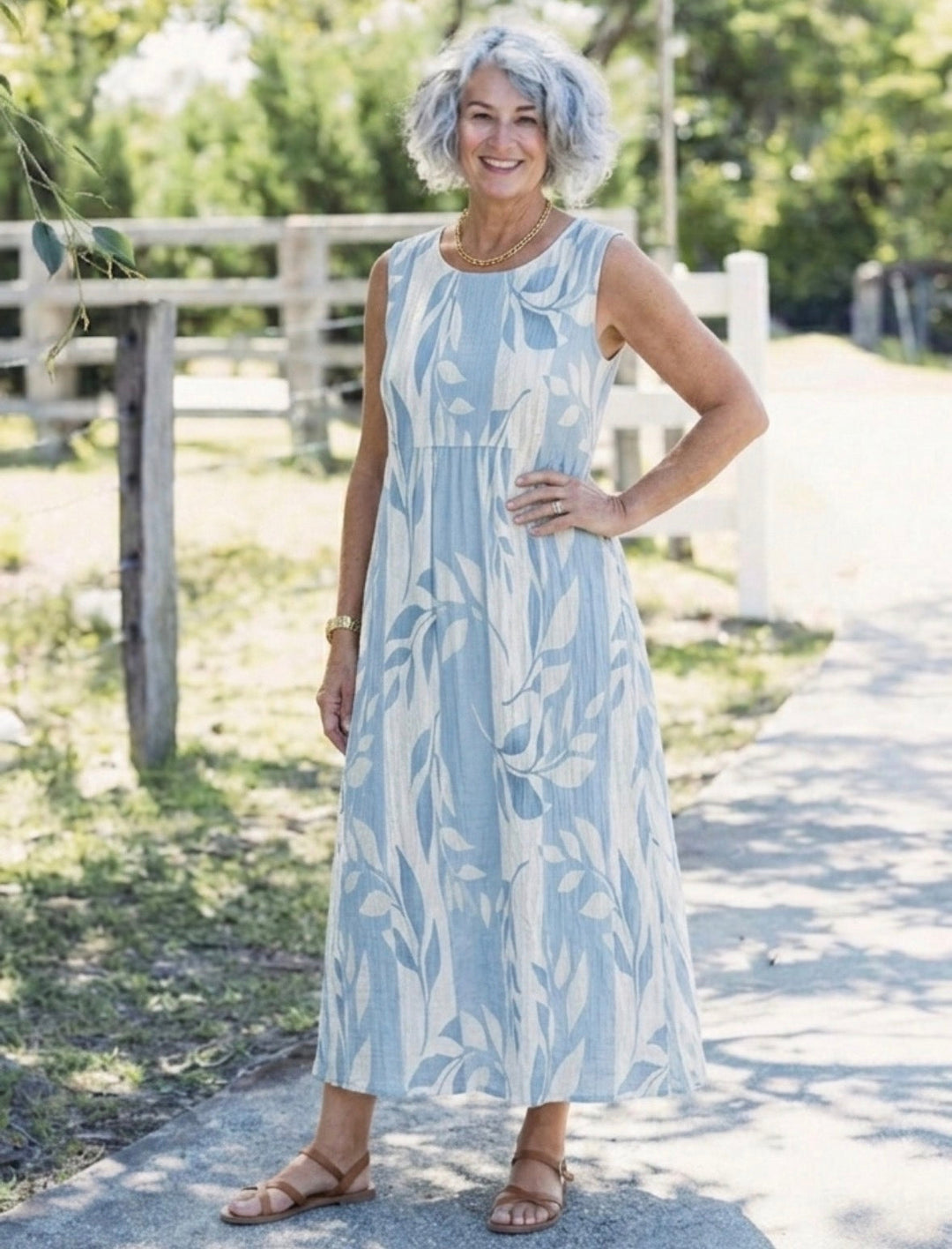 Solene | Ärmelloses Midi-Kleid mit blauem Blättermuster